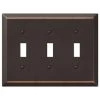 Metallic 3 Gang Toggle Steel Wall Plate - Aged Bronze by AMERELLE