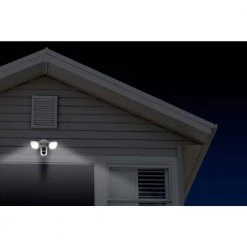 White Outdoor Powered Wi-Fi Camera with Motion Activated Floodlight by Swann -AMERELLE Sales white swann wireless security cameras swififlocam2wus 1f 1000